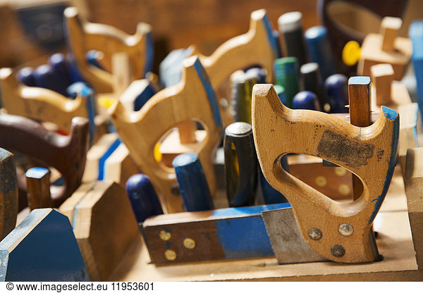Close up of a woodworking tools in a boat-builder's workshop.