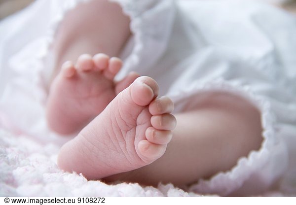 Close up of baby girl's feet