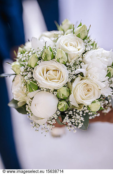 Close-up of bouquet on table at wedding ceremony