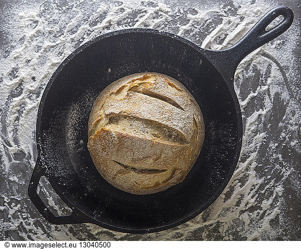 Close-up of bread in cooking pan on kitchen counter