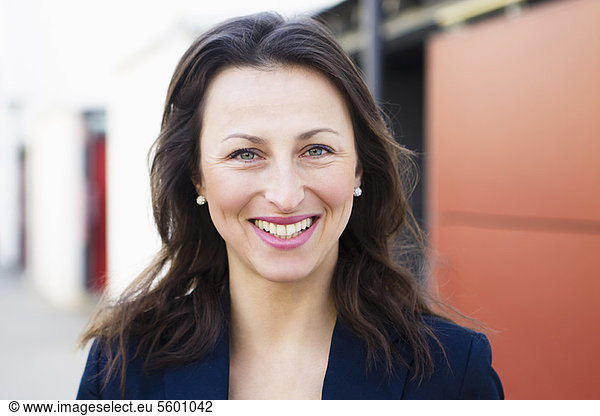 Close up of businesswomans smiling face