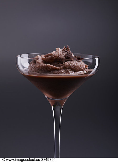 Close-up of Chocolate Martini in martini glass on black background  studio shot