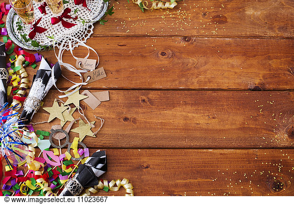 Close-up of Christmas decorations on wooden table