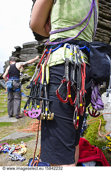 close up of climbing gear on rock climbing harness