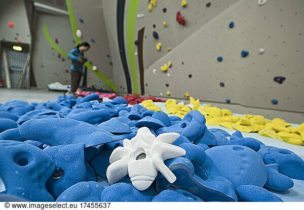 close up of climbing holds at indoor climbing wall
