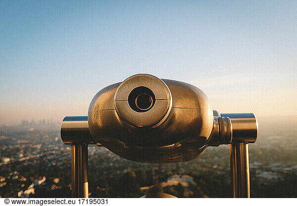 Close up of coin viewer with the City of Los Angeles in the distance