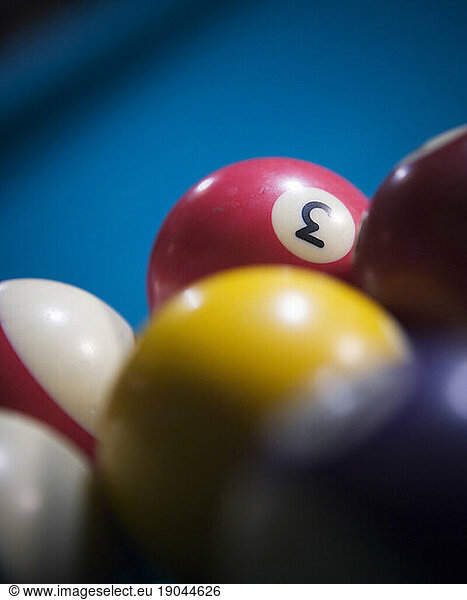 Close up of colored billiard balls.