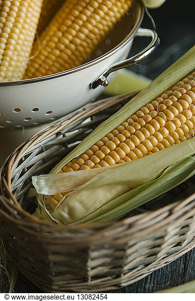 Close-up of corn in containers