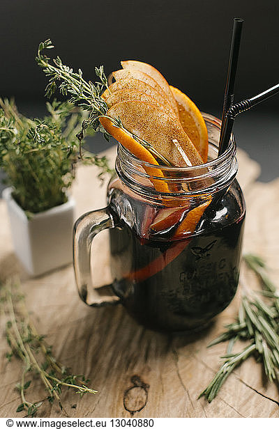 Close-up of drink in mason jar on wooden table