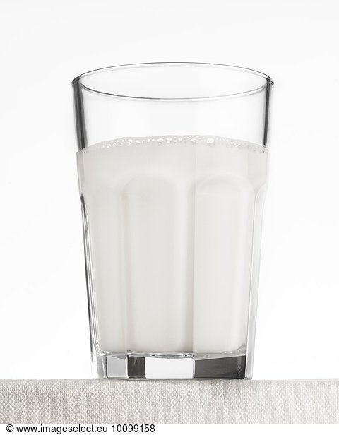 Close up of drinking glass of frothy effervescent water