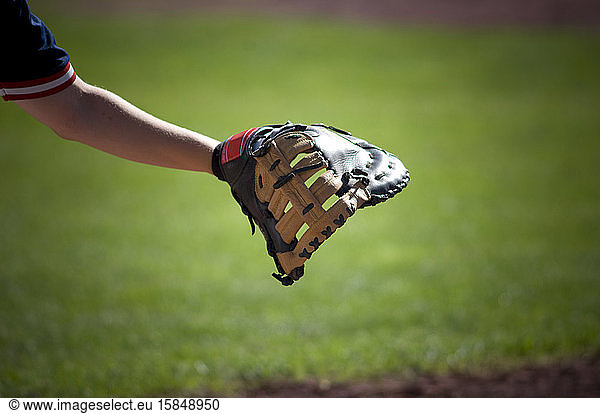 close-up of first baseman's glove reaching out