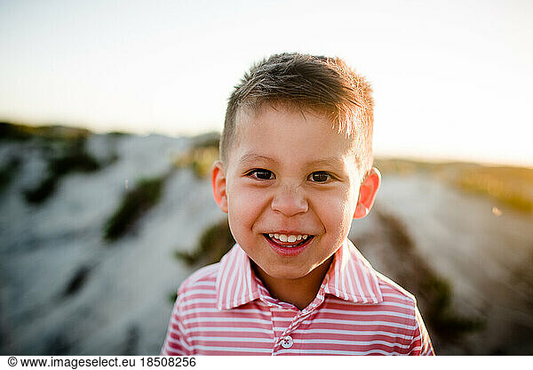 Close Up of Four Year Old Boy Smiling on Coronado Beach in San Diego