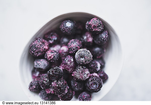 Close-up of frozen blueberries in bowl