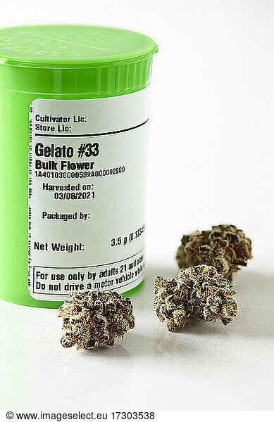 close up of Gelato cannabis flowers in front of dispensary bottle