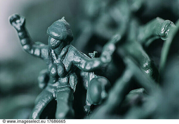 Close-up of green plastic toy soldier