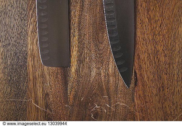 Close-up of knives on cutting board