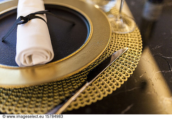 Close-up of lace setting on table in a fancy restaurant