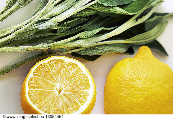 Close-up of lemon and leaf vegetables