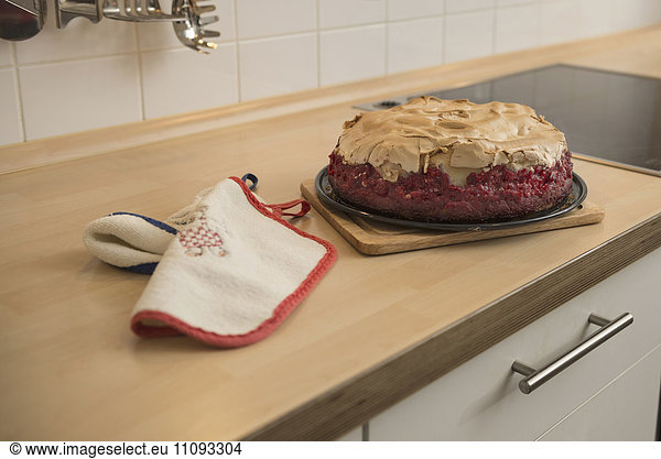 Close-up of meringue cake in kitchen