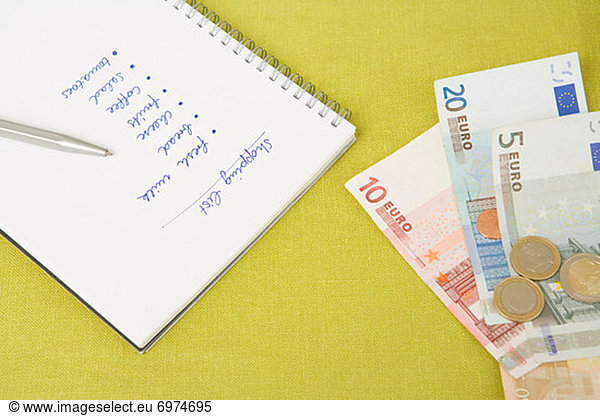 Close-up of Money and Shopping List  Dusseldorf  North Rhine-Westphalia  Germany