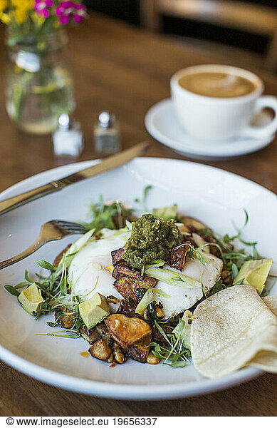 Close-up of plate with serving dish at restaurant  Seattle  Washington  USA