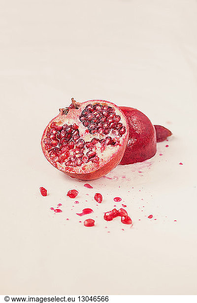 Close-up of pomegranate on white background