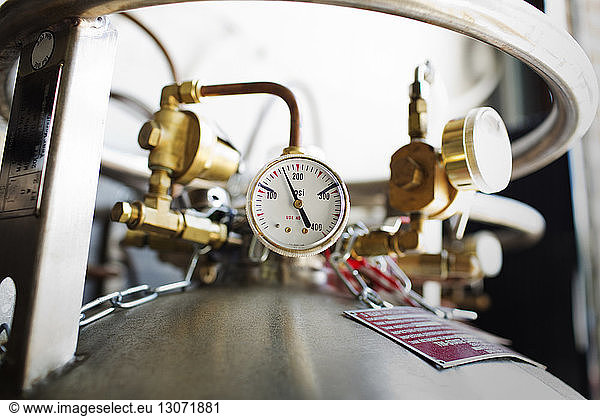 Close-up of pressure gauge at brewery