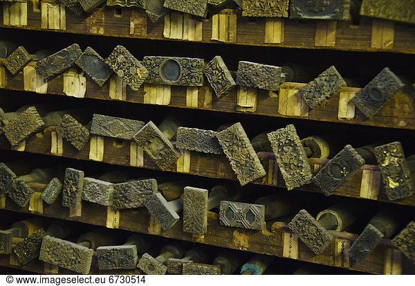 Close up of printing blocks from antique book binding