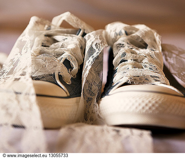 Close-up of shoes with fabric lace