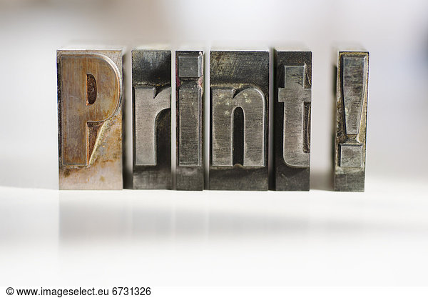 Close up of single word made of printing blocks