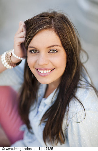 Close up of smiling woman with long hair