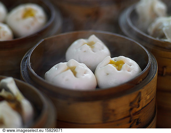 close up of steaming custard dumplings in China