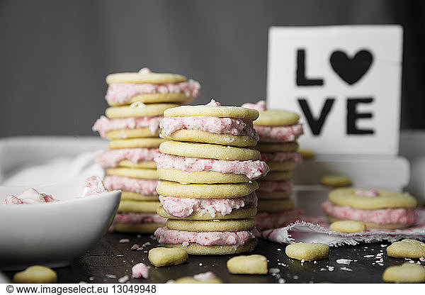 Close-up of sweet food with love text on table