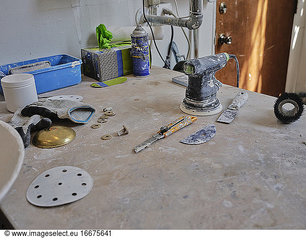 Close-up of tools in plaster studio