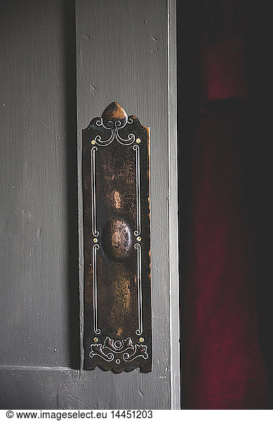 Close up of vintage brass door plate.