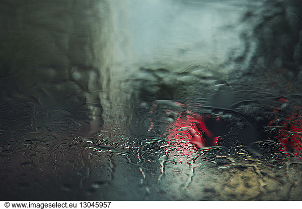 Close-up of wet windshield during rainy season