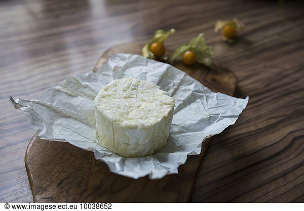 Close-up of white cheese on chopping board  Germany