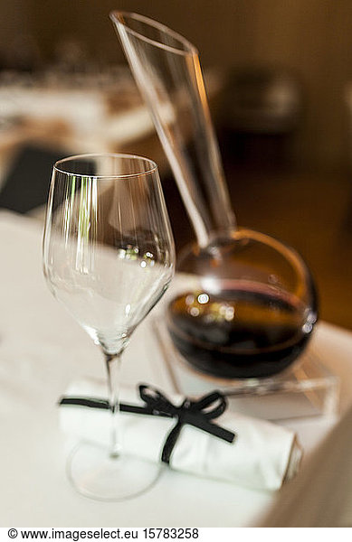 Close-up of wine decanter on table in a fancy restaurant