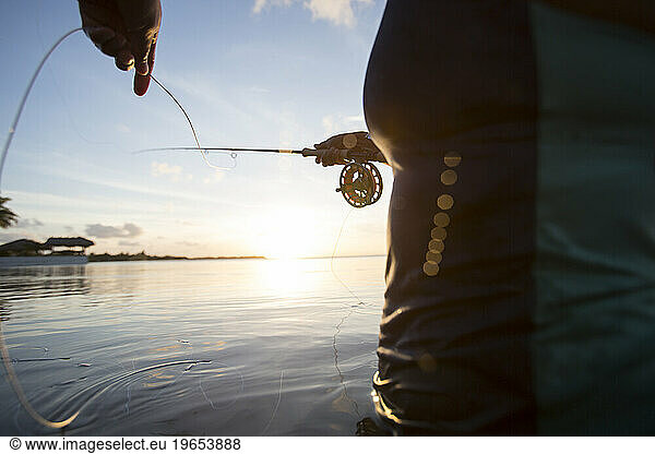 Close-up of woman fishing