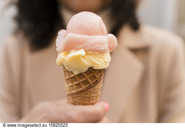 Close-up of woman holding an ice cream cone