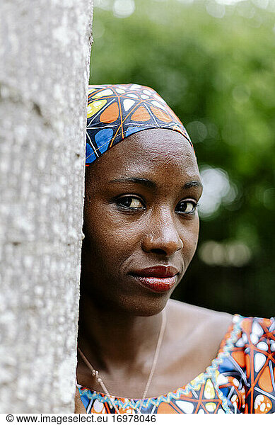 Close up woman wearing african headband outdoor