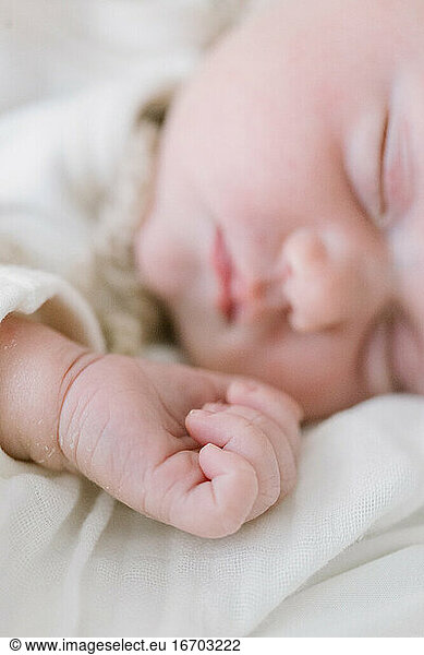 Closeup of a sleeping newborn's hand