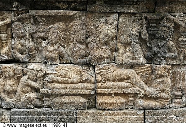 Closeup of beautiful ancient relief on the wall of Borobudur buddhist temple Magelang Java Indonesia Asia.