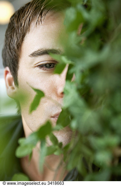 Closeup on man kissing his plants