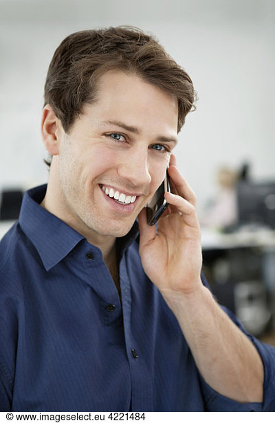 Closeup on man talking in phone