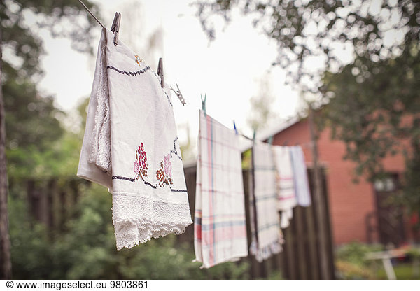 Clothes drying on string at organic farm