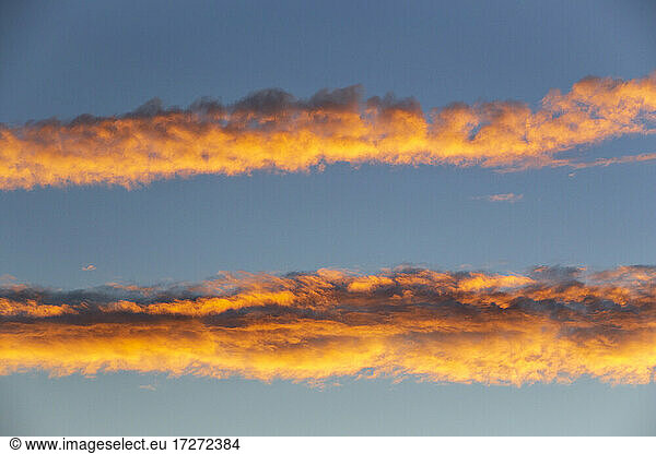 Clouds illuminated by setting sun