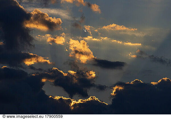 Clouds illuminated by setting sun