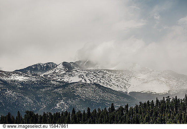 Clouds move over a mountain in Rocky Mountain National Park  Colorado.