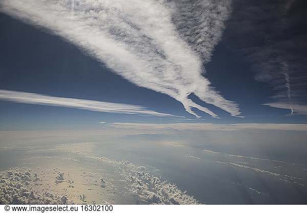 Cloudscape and vapour trails above the Mediterranean Sea